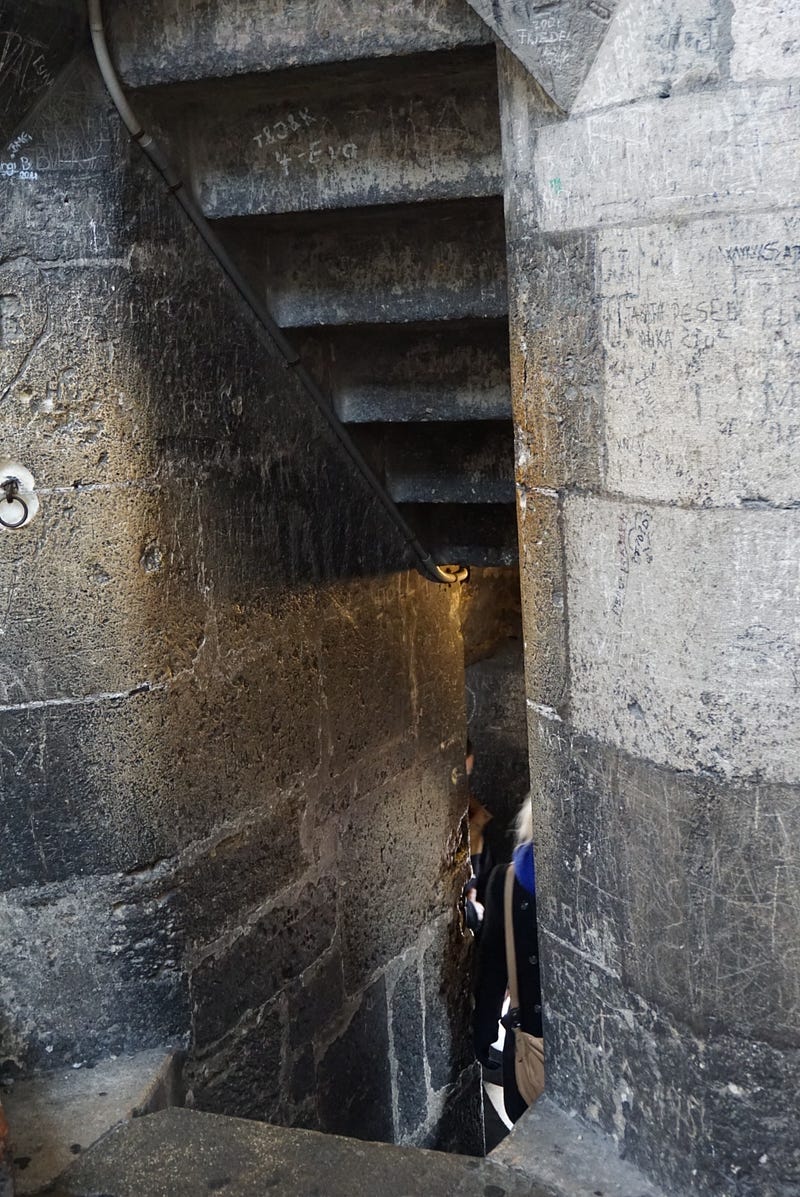 Narrow, old, sprial stone staircase. (I felt like I was going up the tower to rescue a princess). Took us 8–10minutes to get up to the highest point.